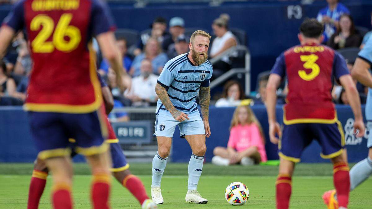 Sporting Kansas City forward Johnny Russell (7) lines up a shot during the first half against Real Salt Lake at Children’s Mercy Park on June 19, 2024.