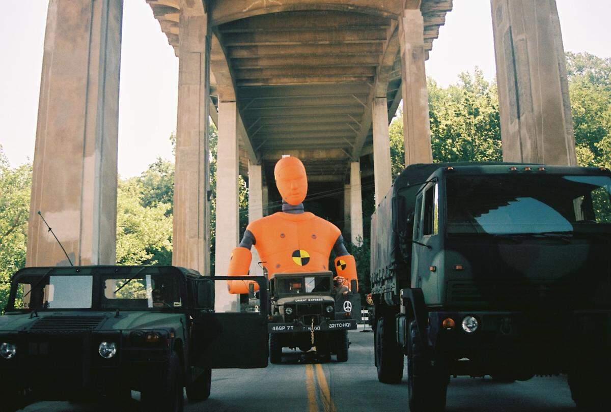 An abandoned 12th Street Bridge lined with military vehicles and an inflatable crash test dummy were used in the music video.