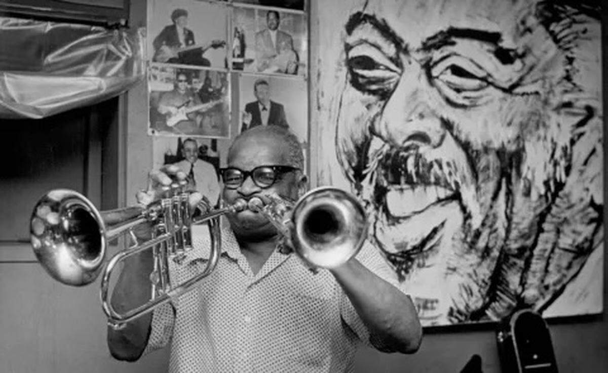 Orville (Piggy) Minor, pictured here in 1983, was known throughout the Kansas City area for his ability to play two trumpets at once.