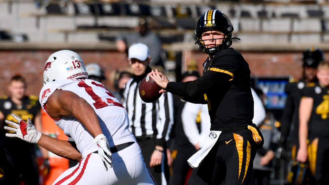 Missouri quarterback Connor Bazelak throws during the first half against Arkansas Saturday in Columbia, where the Tigers rallied and outlasted the Hogs on a last-second field goal.