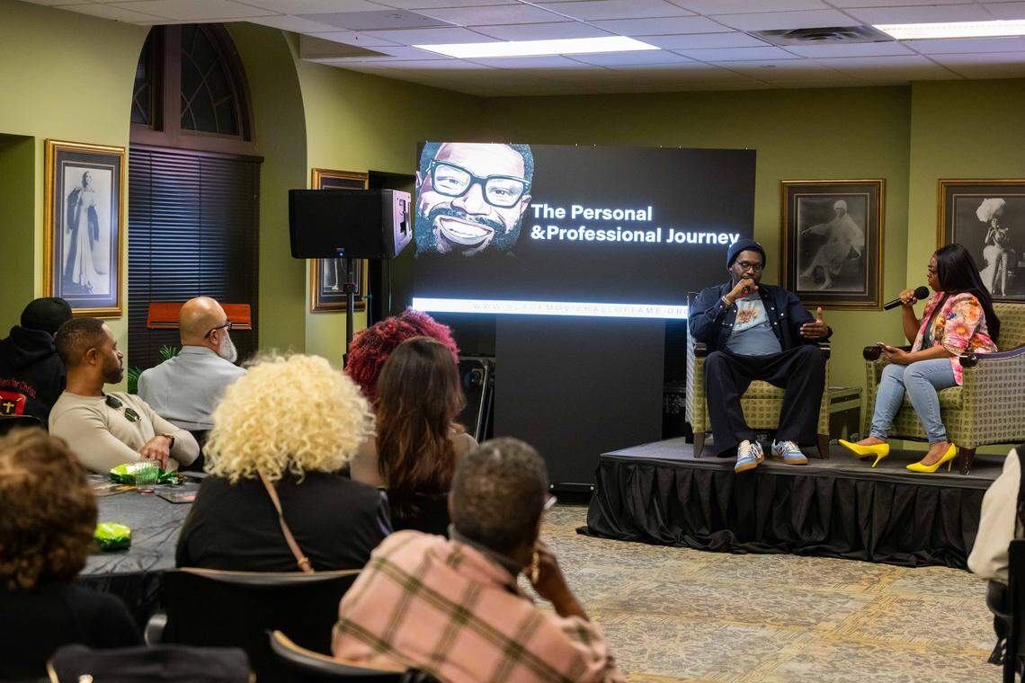 Film critic Shawn Edwards speaks with producer for FOX4, Kharissa Parker, at the launch event for the Black Movie Hall of Fame, at the Black Archives of Mid-America, on Saturday, February 28, 2026. Edwards has been a film critic for FOX4 for the last 25 years.