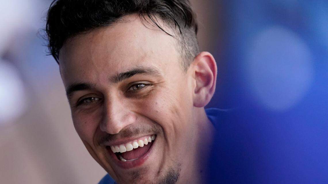 Kansas City Royals’ Nicky Lopez celebrates in the dugout after hitting a two-run home run during the third inning of a game against the Houston Astros on Thursday, Aug. 19, 2021, at Kauffman Stadium in Kansas City, Mo.