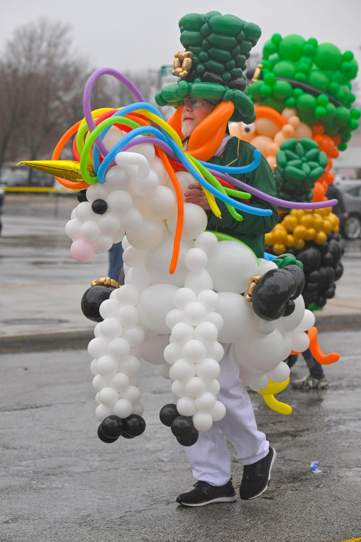 Members from Up, Up & Away! Kansas City Balloons walked in the 2023 Brookside St. Patrick’s Day Warm-Up Parade on Saturday March 11, 2023 in Kansas City.