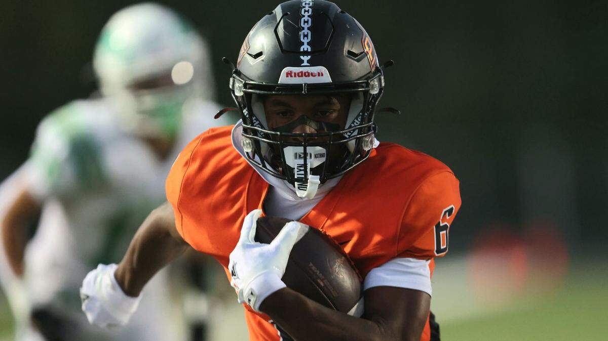 Tres Baskerville takes off for the first of Platte County’s six touchdown receptions during a 49-7 high school football victory over Smithville on Friday, Oct. 3, 2025.