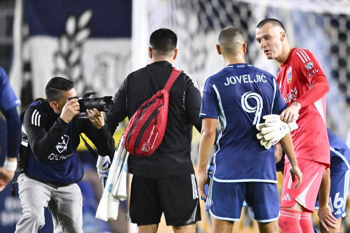 Sporting Kansas City forward Dejan Joveljic (9) meets with LA Galaxy goalkeeper Novak Micovic (1) after the game Dignity Health Sports Park on Sept. 27, 2025.