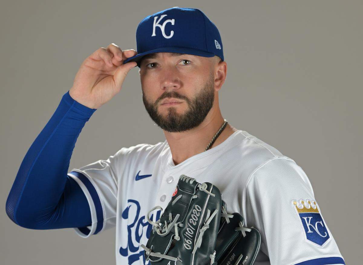 Kansas City Royals pitcher Lucas Erceg poses for photos during the team’s spring training media day event in Surprise, Arizona, on Feb. 19, 2025.