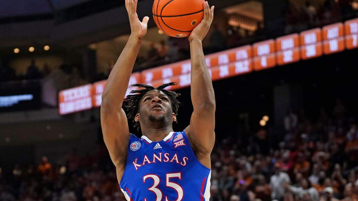 Kansas Jayhawks forward Zuby Ejiofor (35) attempts a layup during the second half against the Texas Longhorns at Moody Center on Feb. 21, 2023.