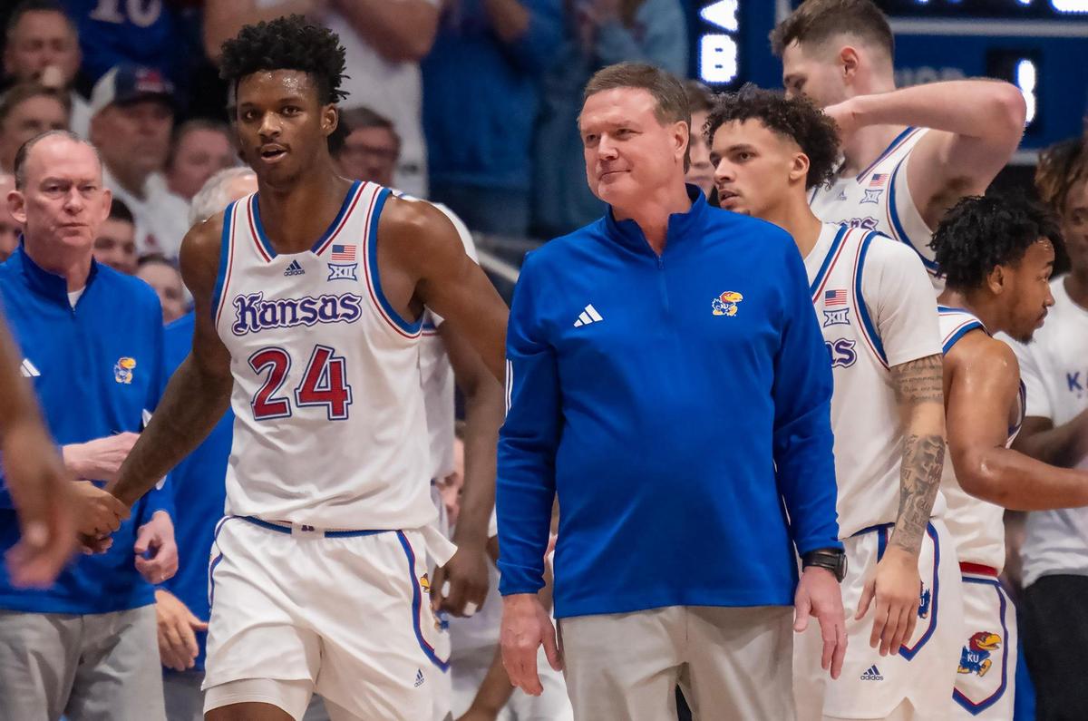 Kansas Jayhawks forward KJ Adams (24) and coach Bill Self at Allen Fieldhouse during the game against Oklahoma State Cowboys on Saturday, Feb. 22, 2025, in Lawrence, Kansas.