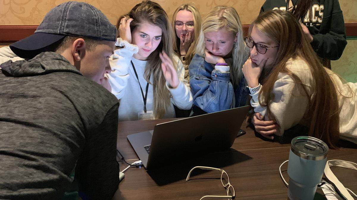 Lee’s Summit High School students Kyle Cumberland, Alyssa Eyre, Hope Kelsey, Riley Moutray and Abbigael Follis edit a film during a competition in Springfield this fall.