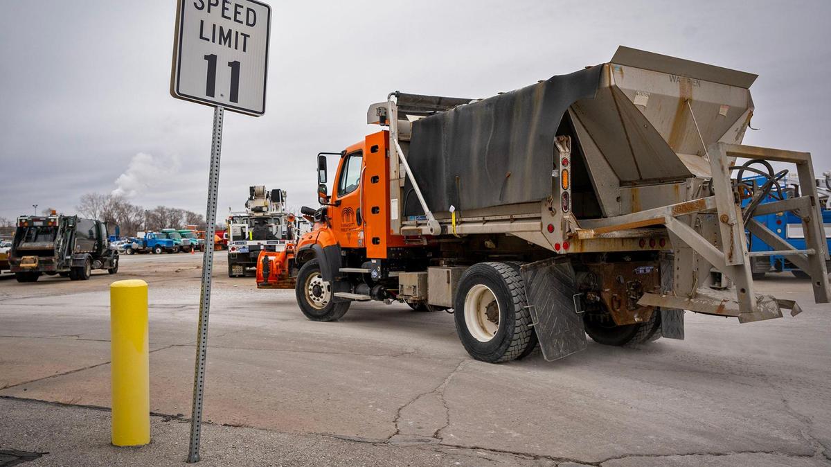 A snowplow truck heads out after getting a load of salt as the city prepared for a major winter storm Saturday, Jan. 4 at the Kansas City Public Works Department in northeast Kansas City.