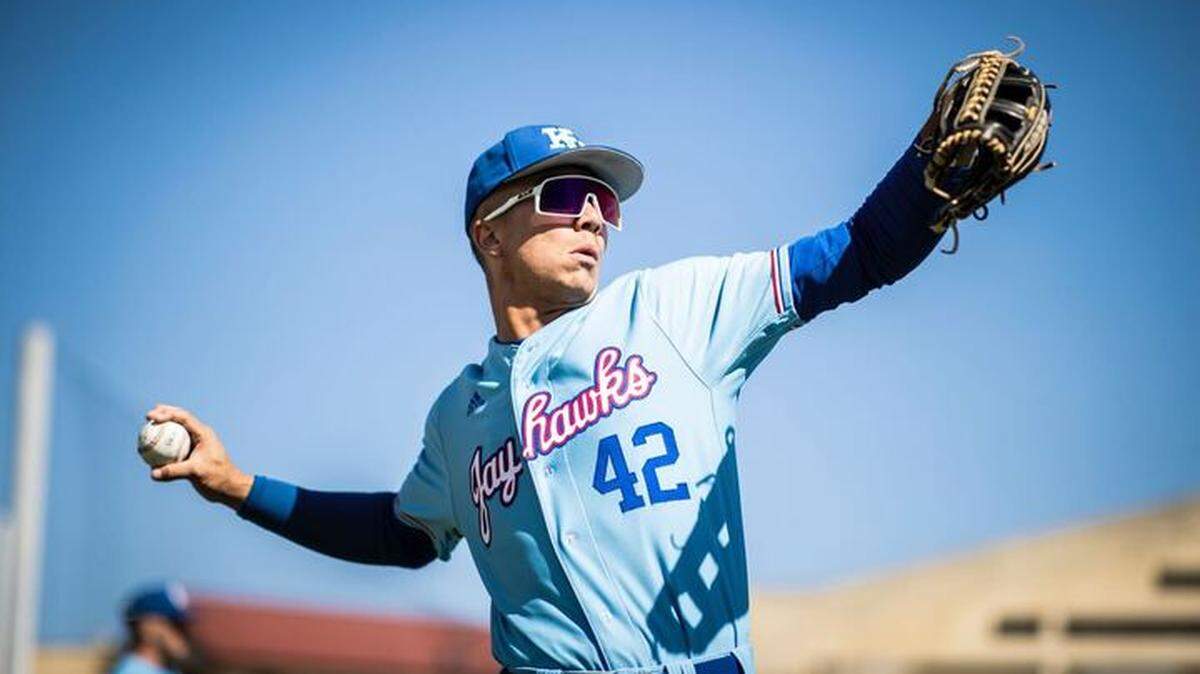 Kansas Jayhawks outfielder Chase Jans warms up before a game during the 2023 season.