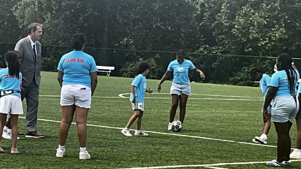 Kids from the Boys and Girls Club of Greater Kansas City kicked around a soccer ball on the fields at the Swope Soccer Village in Swope Park.