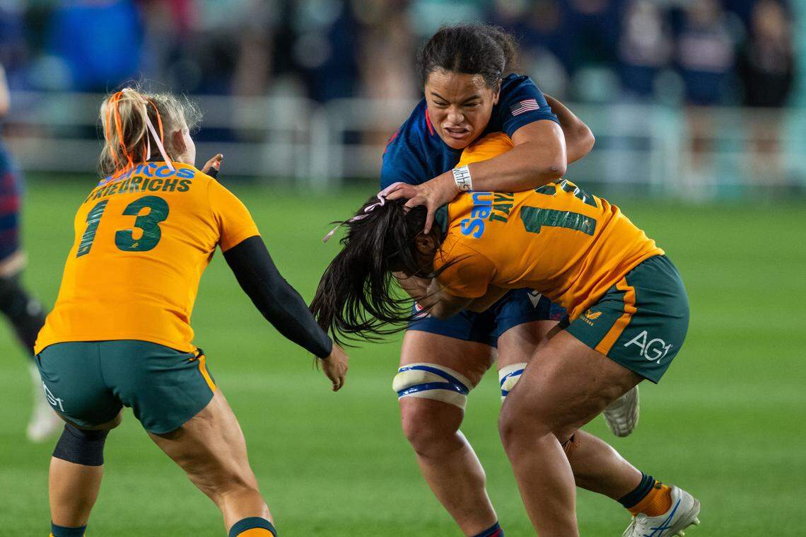 USA player Freda Tafuna stiff arms an Australian player in the back of the head in the first half of the Pacific Four Series rugby match of USA vs. Australia on Friday, April 17, 2026, at CPKC Stadium. Team USA won 33-12.