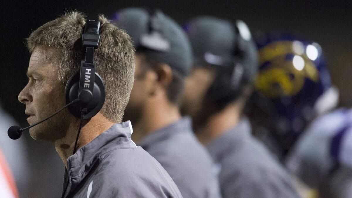 Blue Springs head coach Kelly Donohoe watched his team from the sidelines during the Shawnee Mission West and Blue Springs high school football game at Shawnee Mission South Stadium on Friday, September 16, 2016 in Overland Park, Kansas.