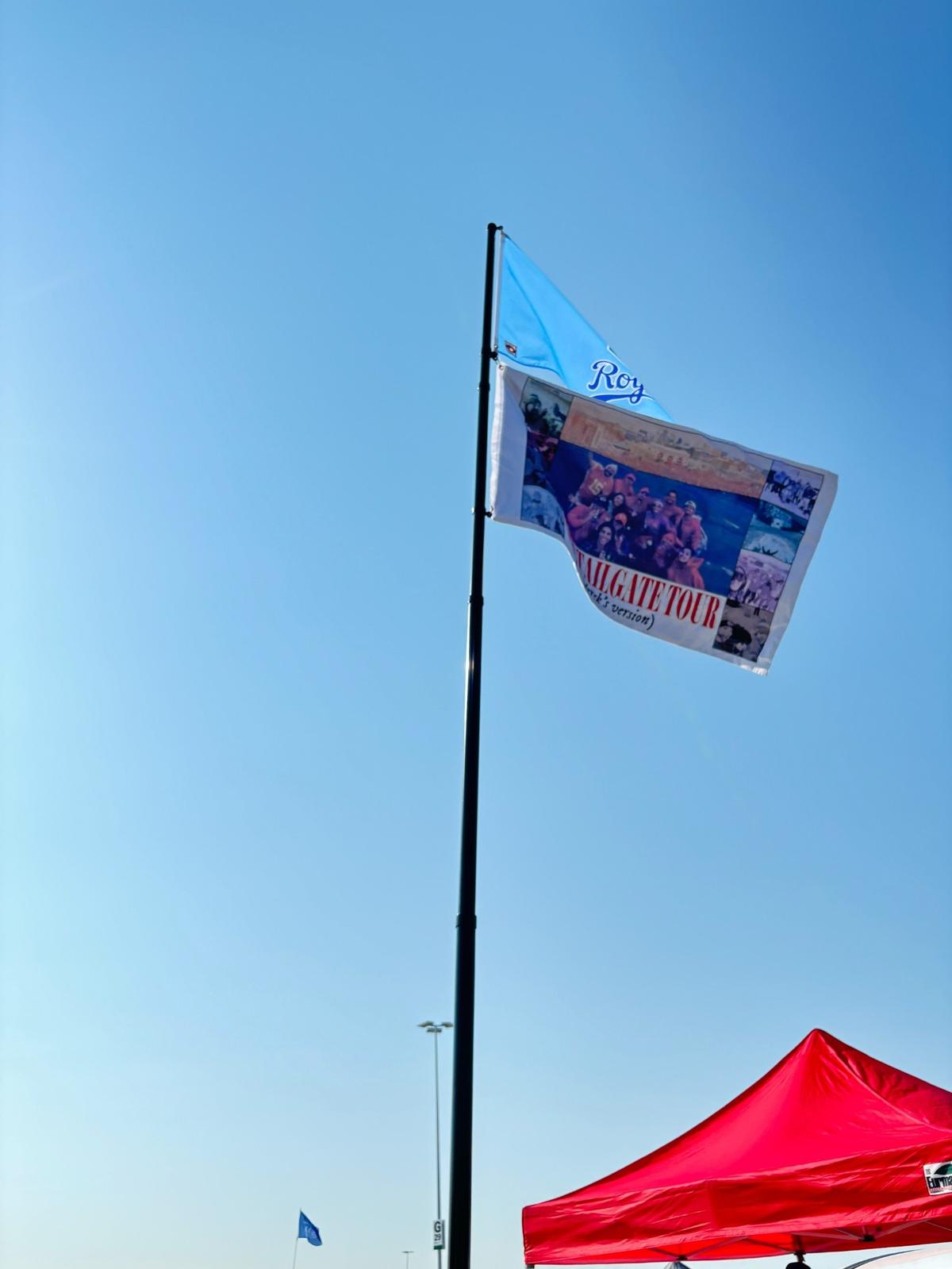 Derek Sellers hoisted two flags above his tent outside Kauffman Stadium on Wednesday ahead of the Royals’ playoff game.