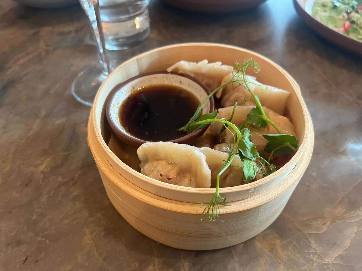 The A5 wagyu dumplings are served at Palm Tree Club, 14 E. 14th St.