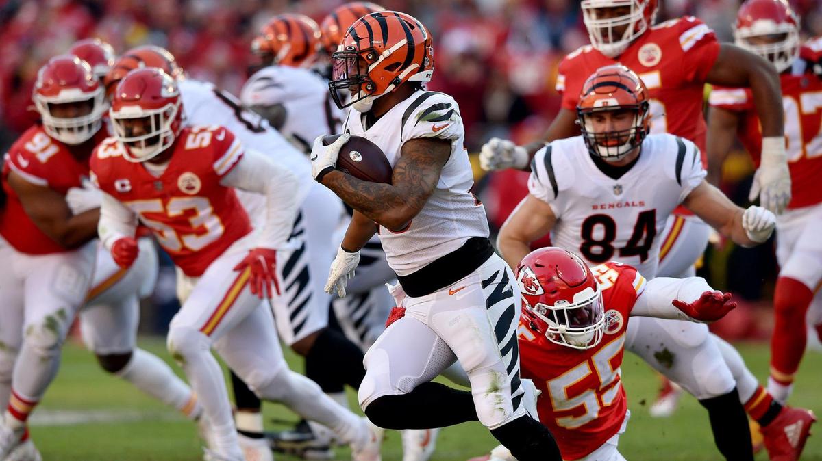 Kansas City Chiefs defensive end Frank Clark misses tackle on Cincinnati Bengals running back Joe Mixon in the second quarter of the AFC Championship Game between at GEHA at Arrowhead Stadium Sunday, Jan. 30, 2022. The Bengals defeated the Chiefs 27-24 in overtime.