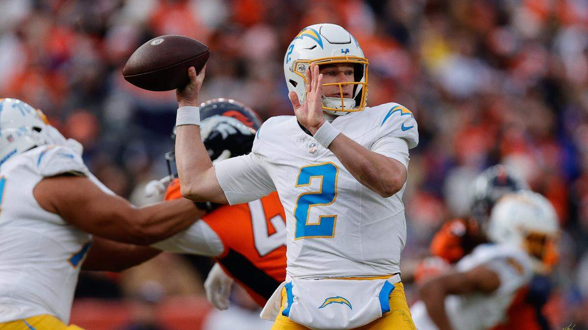 Dec 31, 2023; Denver, Colorado, USA; Los Angeles Chargers quarterback Easton Stick (2) attempts a pass in the second quarter against the Denver Broncos at Empower Field at Mile High. Mandatory Credit: Isaiah J. Downing-USA TODAY Sports