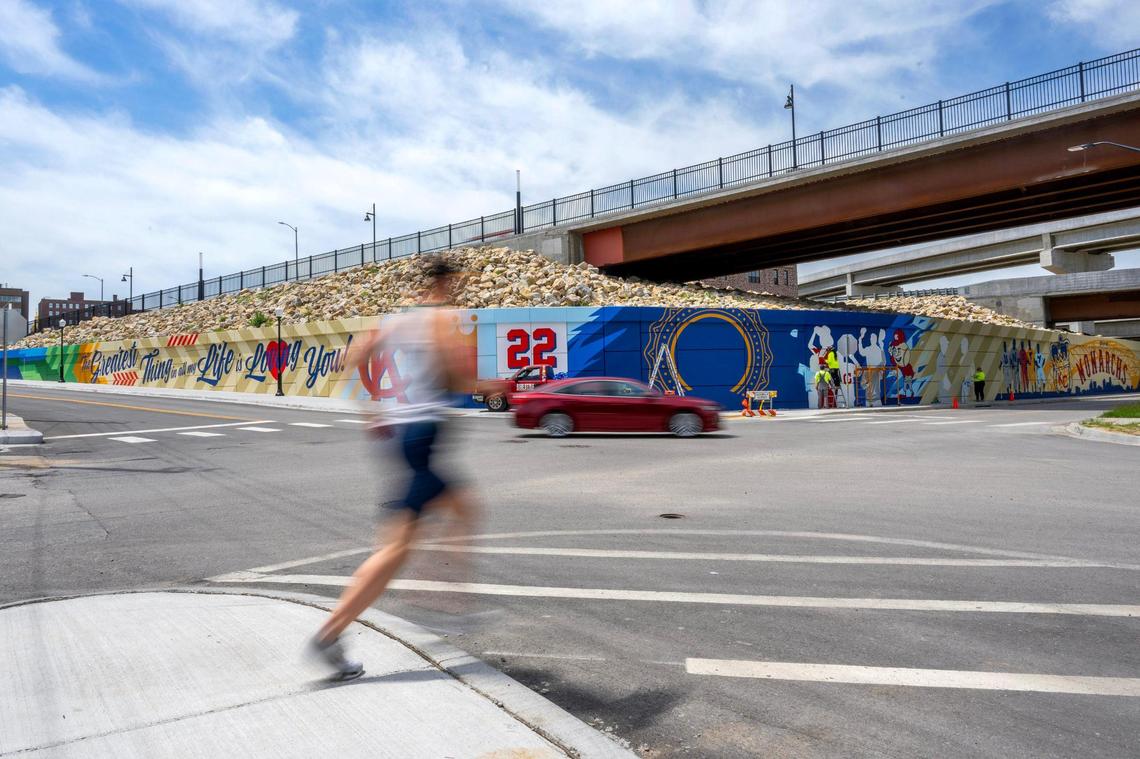 A mural by Sike Style Industries commemorating the new Buck O’Neil Bridge is seen nearly complete at the intersection of Broadway Boulevard and West 3rd Street on Tuesday, May 6, 2025, in Kansas City.