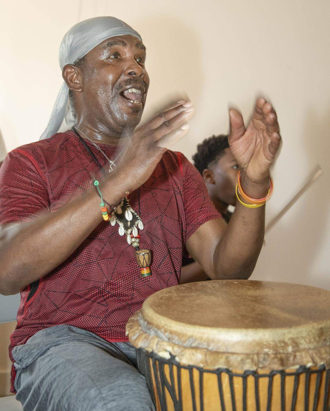 Danny Hinds, founder of Art in Motion LLC., played the Djembe during an African dance and drum class Saturday, October 11, 2025 at Inner Space, 2711 Troost Ave. in Kansas City.