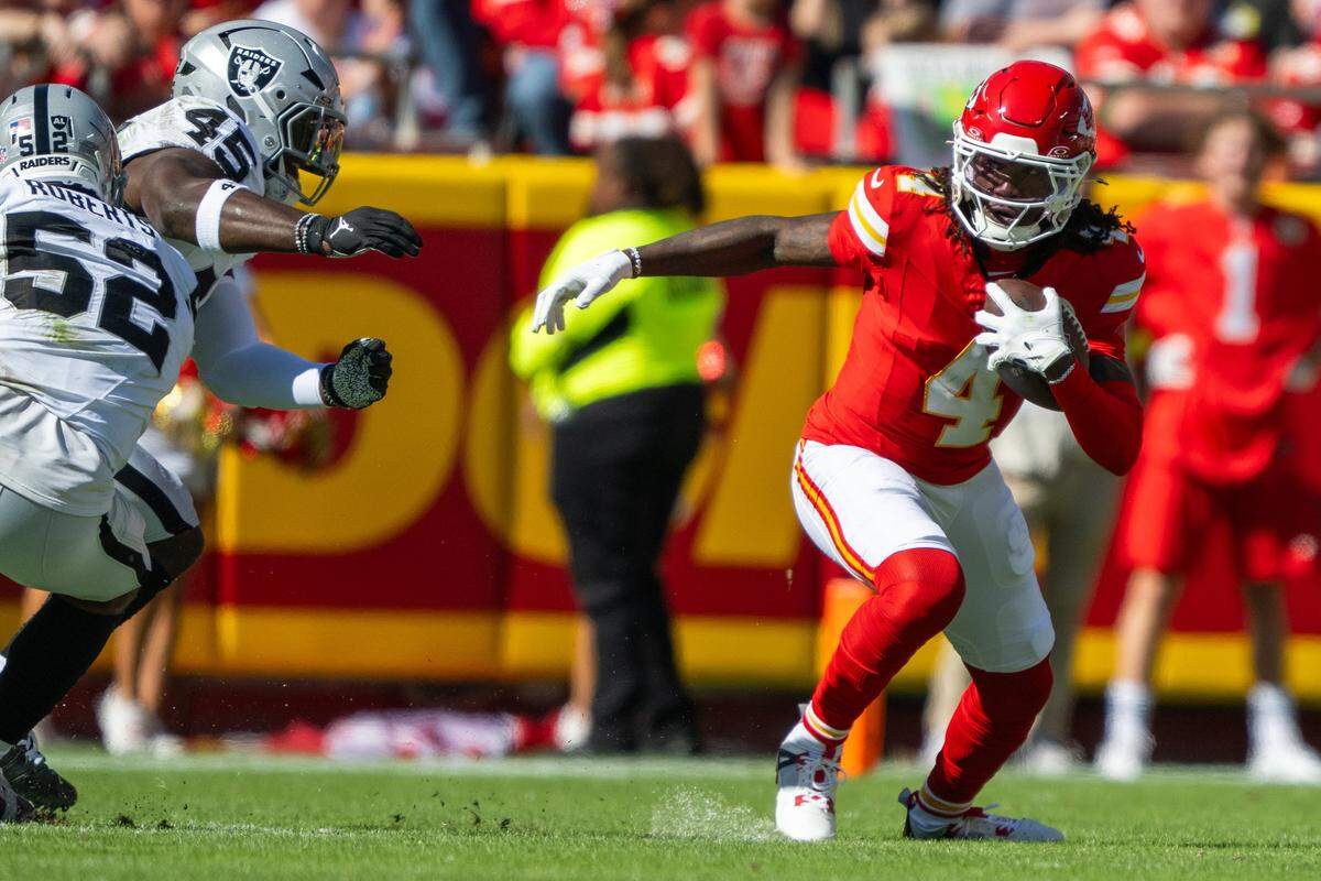 Chiefs wide receiver Rashee Rice (No. 4) makes a move on a Las Vegas Raiders defender during the first half of an NFL Week 7 game against the Las Vegas Raiders on Sunday, Oct. 19, 2025, at GEHA Field at Arrowhead Stadium in Kansas City.