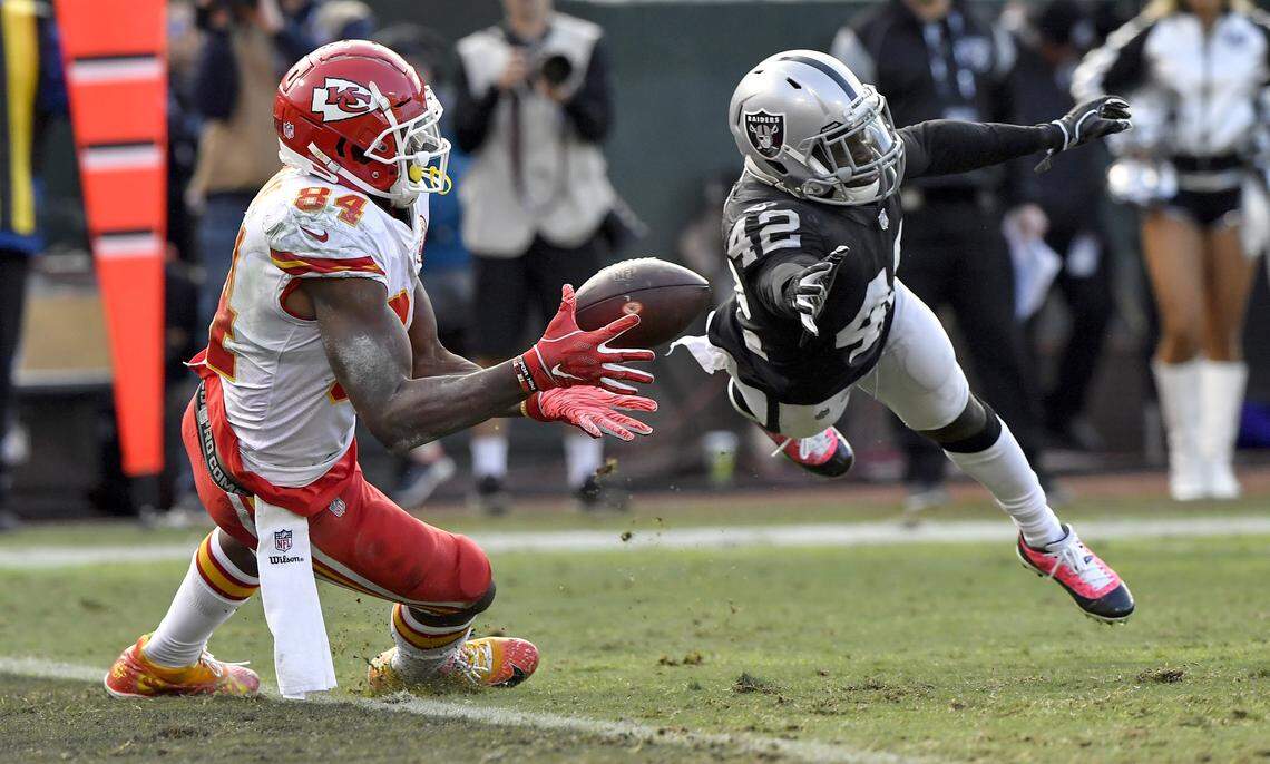 Kansas City Chiefs tight end Demetrius Harris pulled in a touchdown pass late in the third quarter past the outstretched arm of Oakland Raiders defensive back Karl Joseph in Oakland. It was Chiefs quarterback Patrick Mahomes’ 40th touchdown pass of the 2018 regular season.
