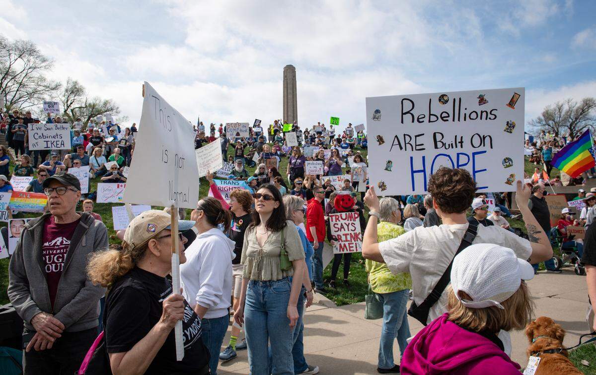 The hill on the northern side of the National World War I Museum and Memorial was packed with thousands of people during a pro-democracy rally that took aim at the Trump administration’s policies Saturday, March 29, 2025 in downtown Kansas City.