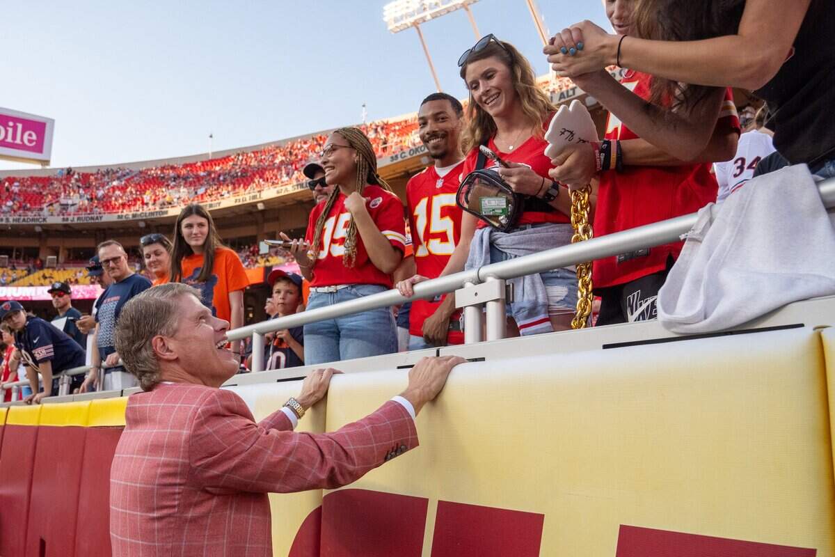 Kansas City Chiefs CEO Clark Hunt greets fans in the front row before the Chiefs preseason game vs. the Chicago Bears at GEHA Field at Arrowhead Stadium on Friday, Aug. 22, 2025, in Kansas City.