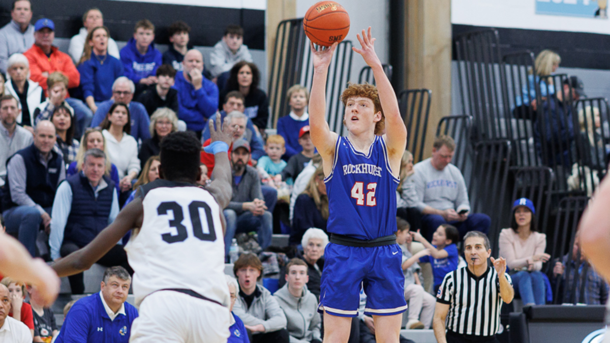Kevin Sullivan launches a 3-pointer during Rockhurst’s 66-54 win at Shawnee Mission East on Friday night.