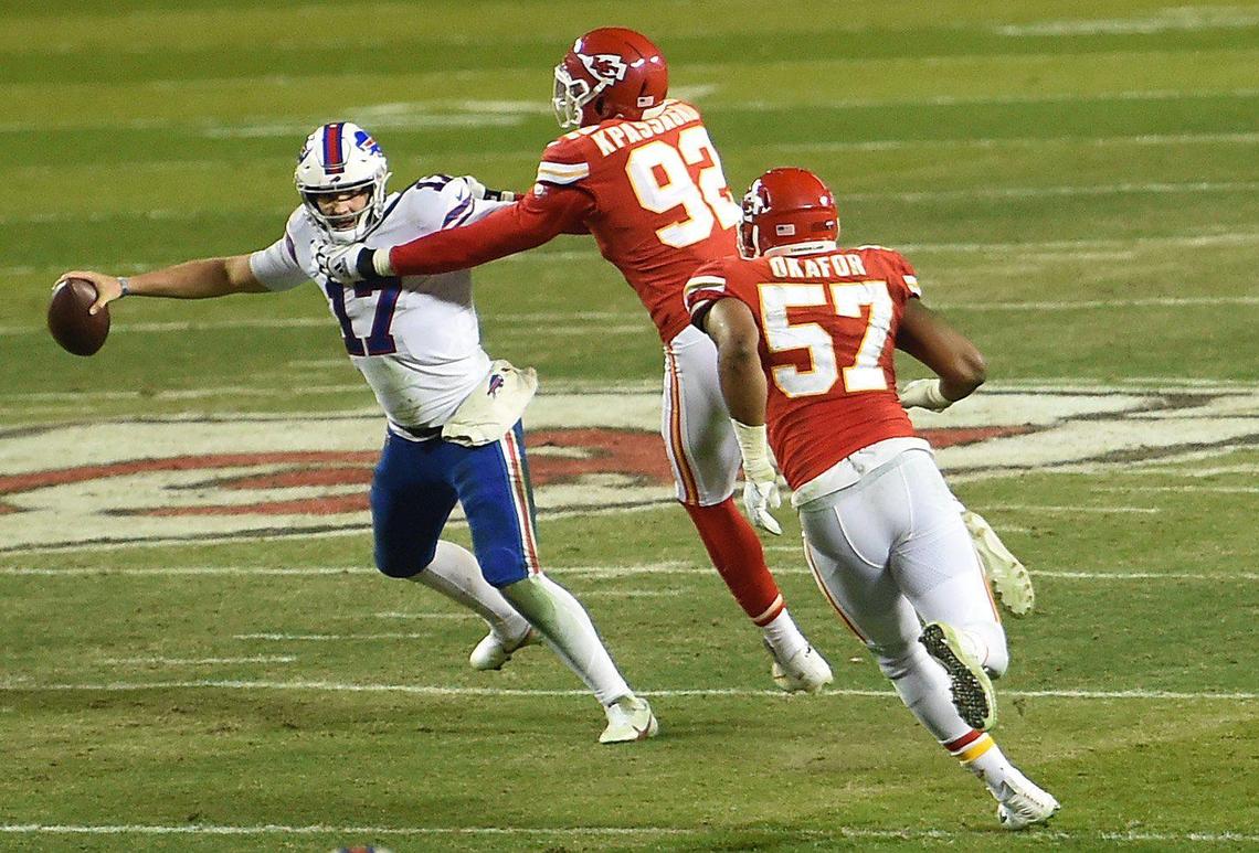 Kansas City Chiefs defensive end Tanoh Kpassagnon (17) and defensive end Alex Okafor sack Buffalo quarterback Josh Allen (17) during the fourth-quarter of the AFC Championship Game Sunday, Jan. 24, 2021, at Arrowhead Stadium in Kansas City. The Chiefs defeated the Bills, 38-24, to head to the Super Bowl.
