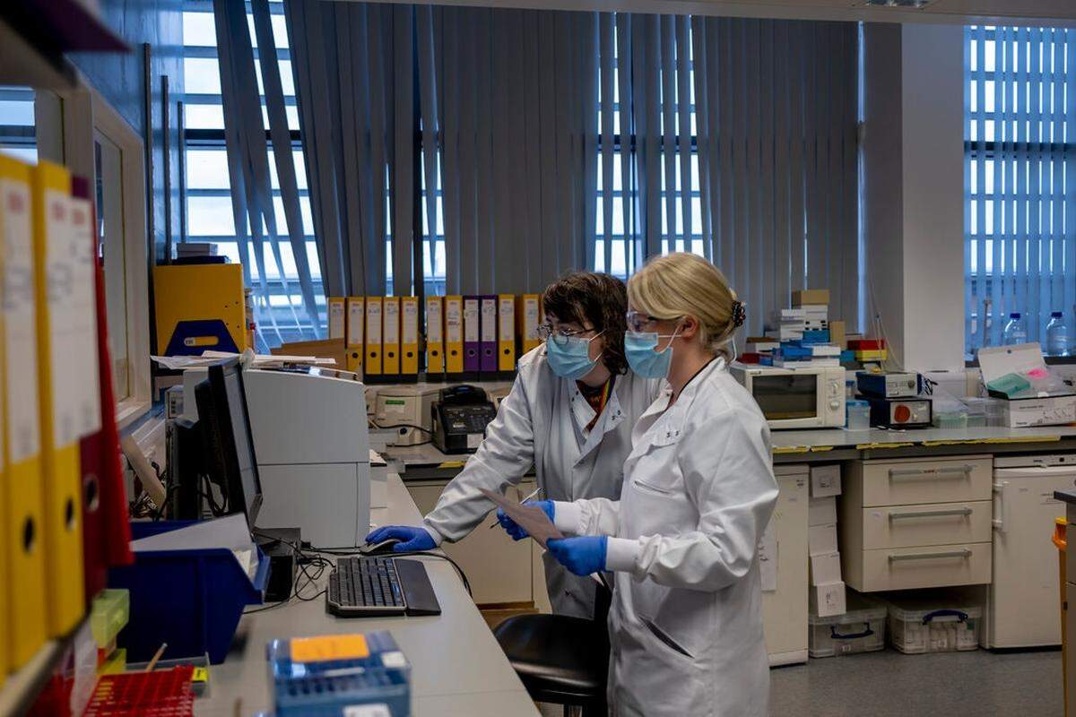 Vaccine lab workers at Oxford. The U.S. government in May awarded AstraZeneca up to $1.2 billion in exchange for 300 million doses.