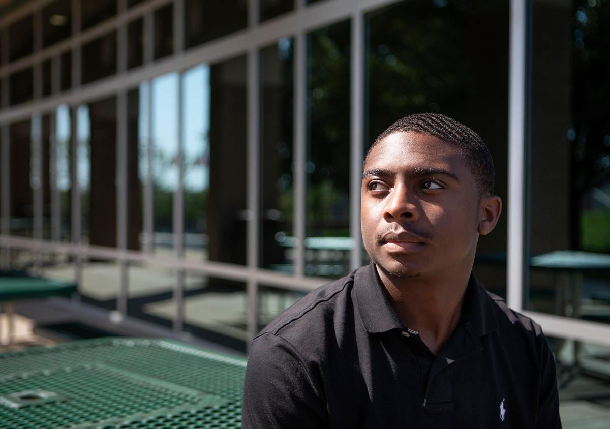 Cameron Shinault poses for a portrait at the Maplewoods Community College Student Center on Thursday, Sept. 5, 2019. Shinault is paying for school at MCC with an A+ state scholarship.