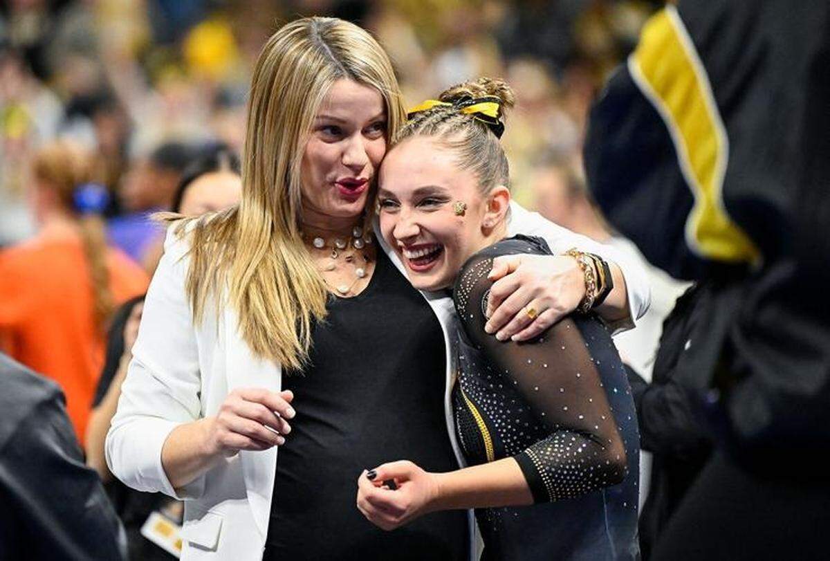 Addison Lawrence, right, from Olathe, has had a hand in the Missouri Tigers’ gymnastics success.
