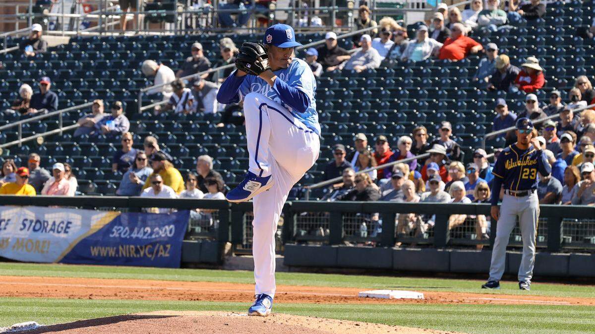 Kansas City Royals pitcher Zack Greinke works against the Milwaukee Brewers during a spring training game in Surprise Arizona on Monday.