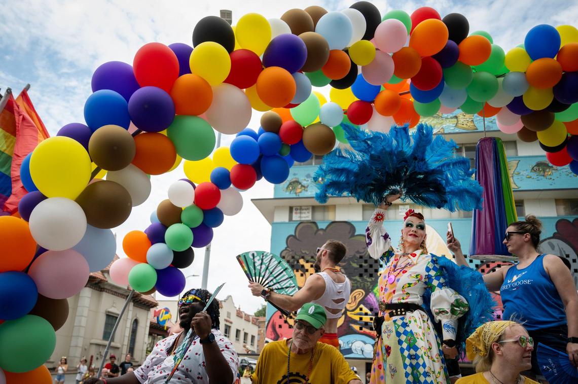 Performers from Missy B’s rode on their float during the KC Pride Parade.