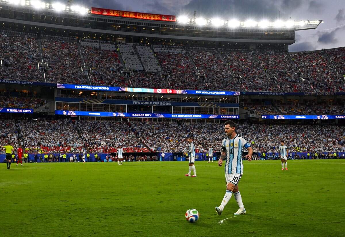 Argentina forward Lionel Messi (10) dribbles the ball under the stadium lights at the Argentina vs. Switzerland 2026 World Cup Quarterfinal football match at Kansas City (Arrowhead) Stadium in Kansas City on Saturday, July 11, 2026.