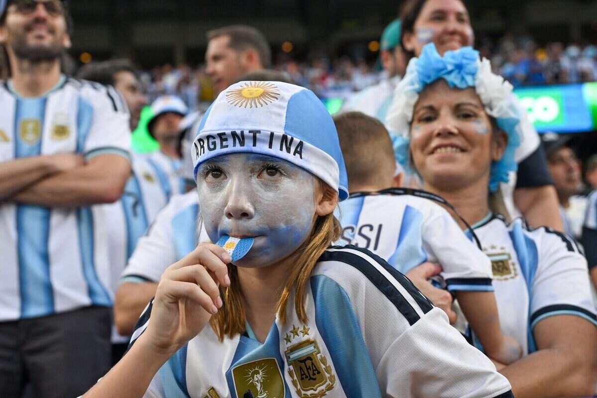 An Argentina fan watches the intently at the Argentina vs. Algeria FIFA World Cup group-stage soccer match at Kansas City (Arrowhead) Stadium in Kansas City on Tuesday, June 16, 2026.