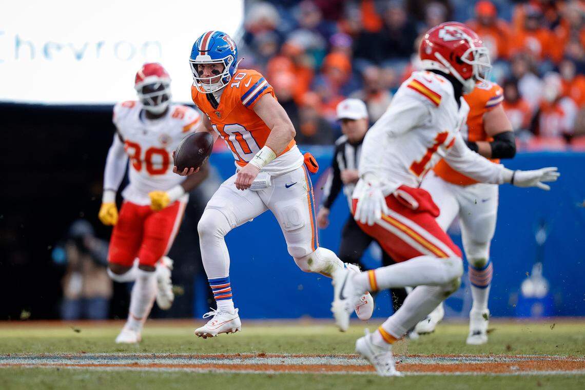 Denver Broncos quarterback Bo Nix (No. 10) runs the ball against the Kansas City Chiefs during the teams’ NFL Week 18 game at Empower Field at Mile High in Denver on Sunday, Jan. 5, 2025.