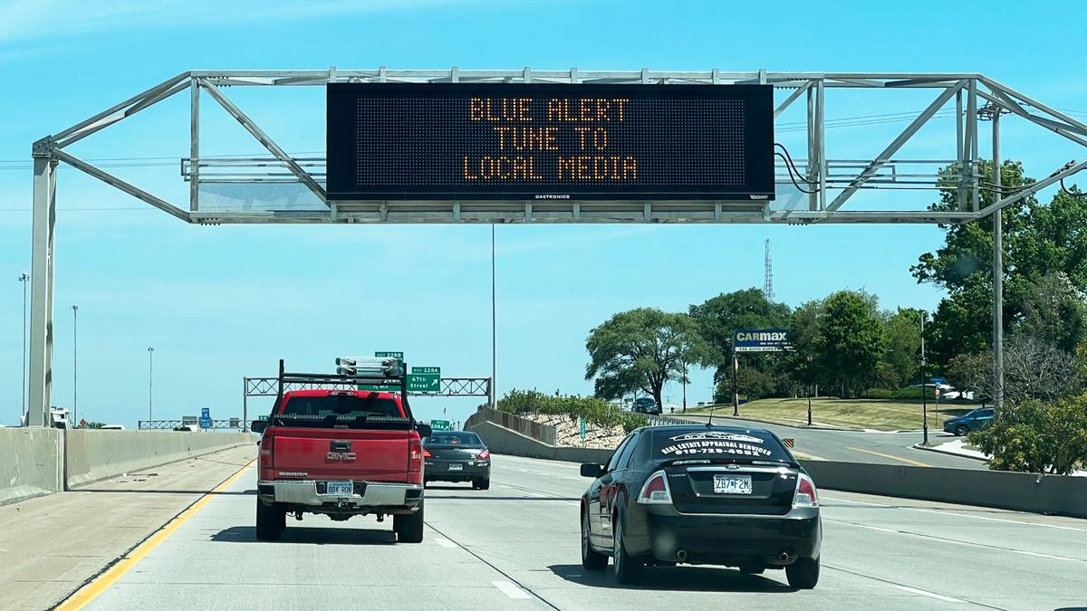 A KC Scout sign on I-35 in Overland alerts travelers to the blue alert sent out by the Missouri Highway Patrol after an officer was shot during a traffic stop Tuesday in North Kansas City.