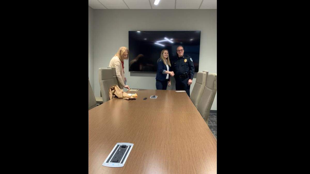 Rachel Scattergood, left, and Gladstone Police Chief Fred Farris, during Scattergood’s swearing in ceremony in February 2024.