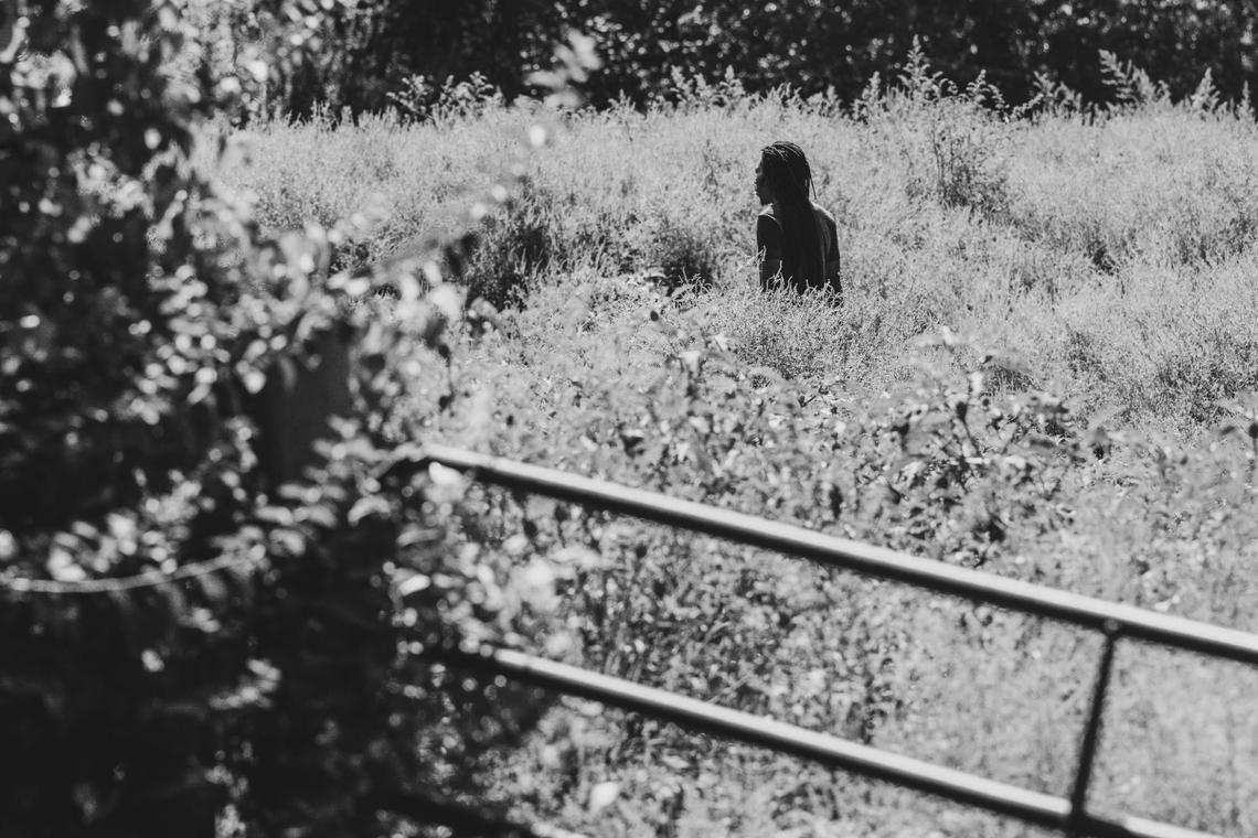 Your’Majesty El Bey, aka YM Bey, aka “Smoke,” walks through the pasture at the Copper Boyz Ranch in Kansas City. Bey assumes the title of president of the Copper Boyz at the age 36. He learned ranching from his father and family members who all have a background in caring for horses.