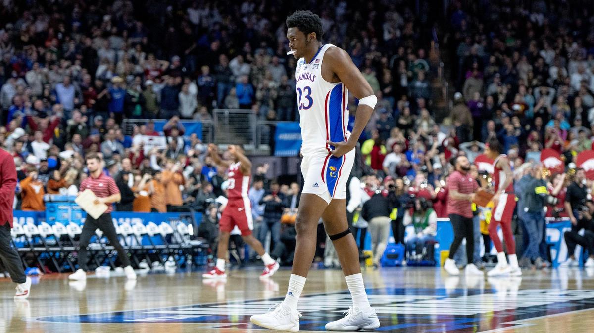 Kansas center Ernest Udeh Jr. (23) walks off the court after losing 72-71 to Arkansas in a second-round college basketball game in the NCAA Tournament Saturday, March 18, 2023, in Des Moines, Iowa.