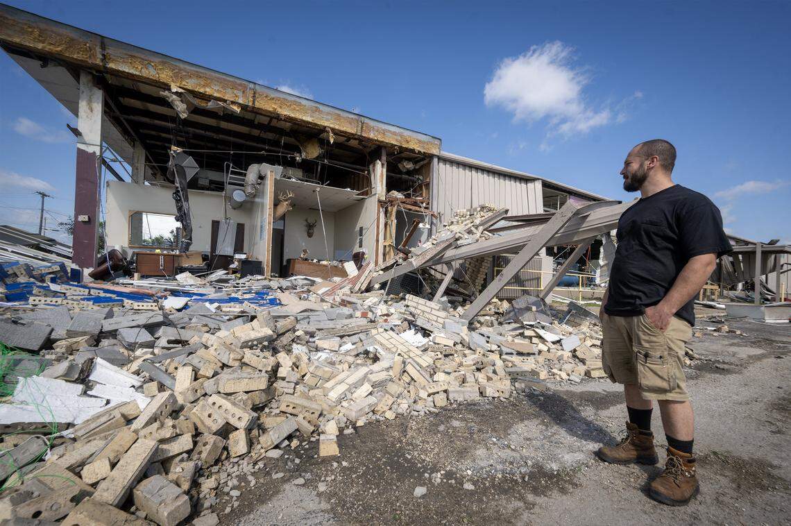 Kendal Anderson, 31, had just moved from Kansas City to Ottawa two months ago, after securing a job at TruComp Pipe, a manufacturer of high-pressure gas and oil pipes. On Tuesday, Anderson looked over what remained of TruComp after a tornado hit the plant on Monday night.