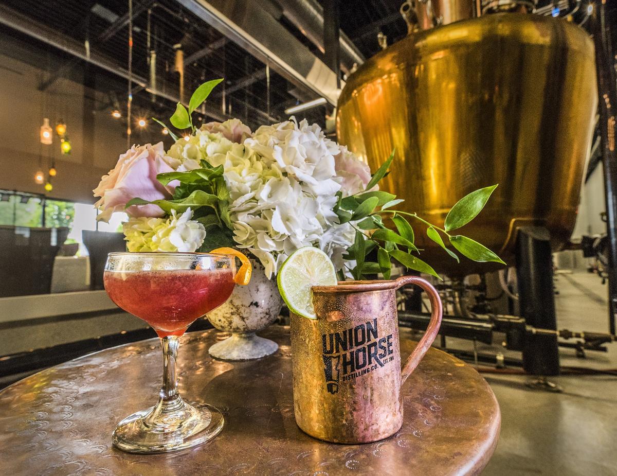 For the Hammers' wedding reception, Union Horse served the Blushing Bride, made by shaking the distillery's reserve straight bourbon with orange liqueur and lemon juice and topping it with a red wine float, and the Golden Groom, a Moscow mule variant featuring Rider vodka and Kansas City Canning Co.’s blood orange ginger shrub.