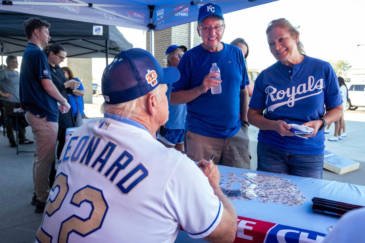 Former Royals pitcher Dennis Leonard talks with Royals fans during Bring Out the Blue, a tailgating event at the Price Chopper in Lee’s Summit on Monday, Sept. 30, 2024.