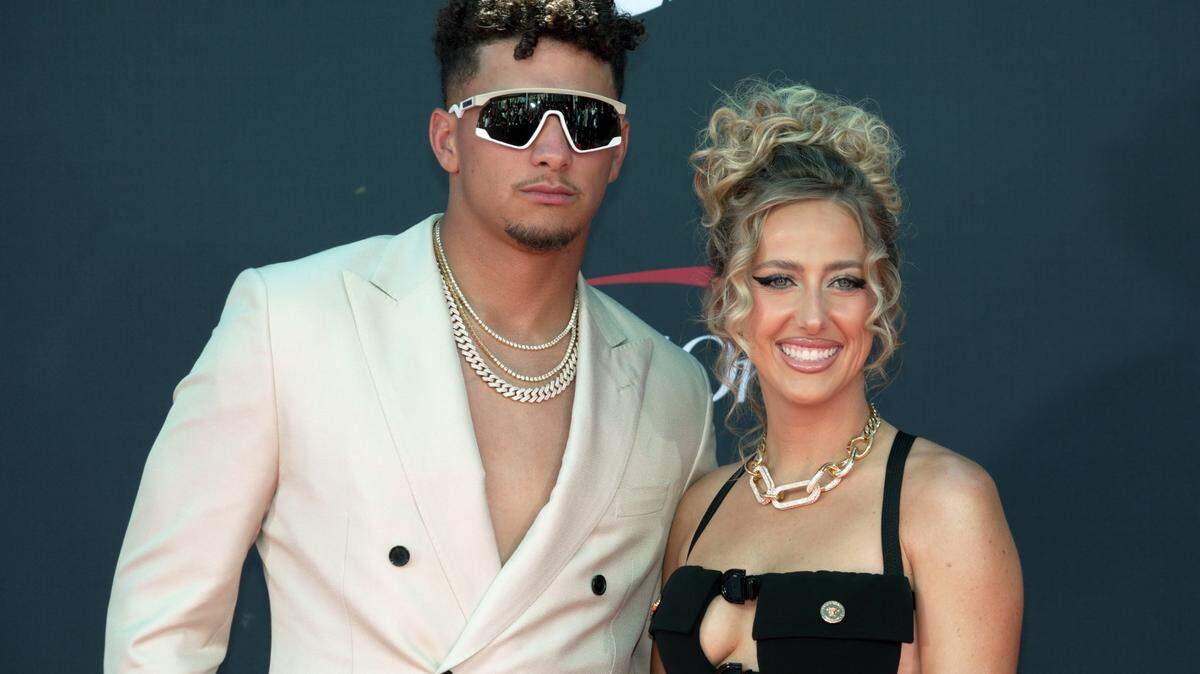 Kansas City Chiefs quarterback Patrick Mahomes and his wife, Brittany Mahomes, looked cool on a toasty red carpet at the ESPY Awards Wednesday.