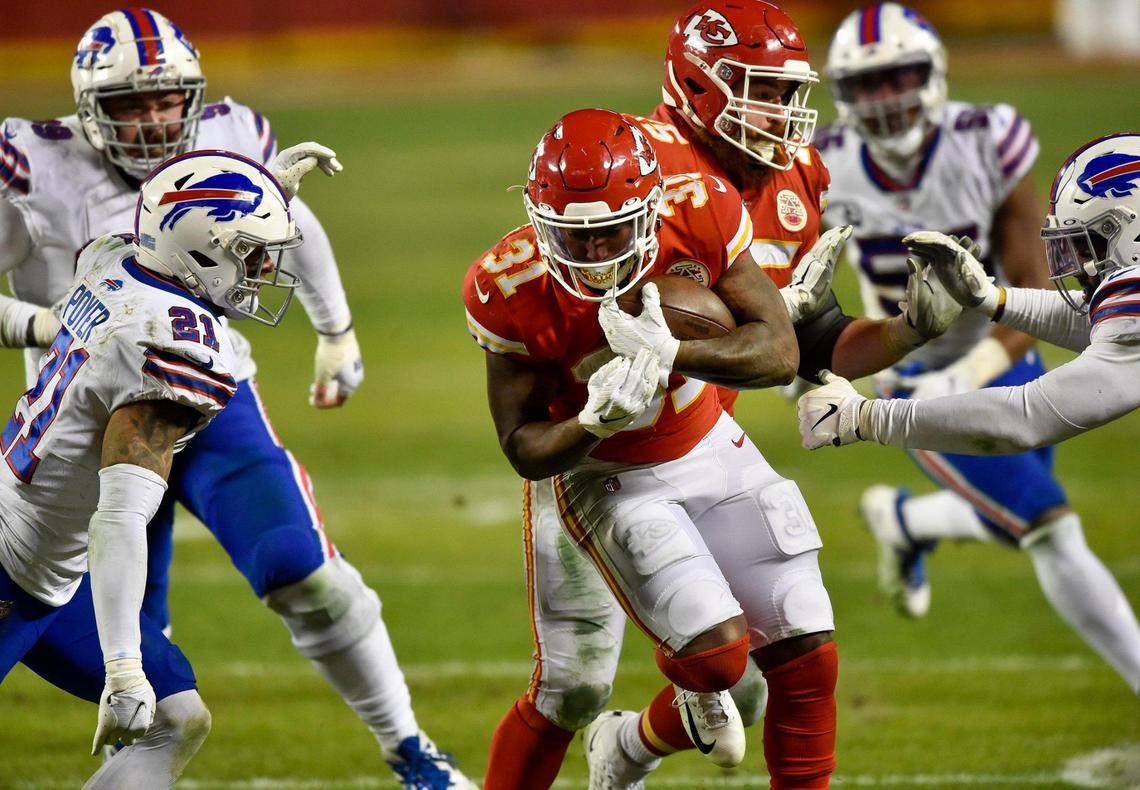 Kansas City Chiefs running back Darrel Williams runs for a first down in the fourth quarter, sealing the Chiefs victory. Quarterback Patrick Mahomes kneeled for the next three plays until the end of the game. The Kansas City Chiefs defeated the Bills 38-24 to win AFC Championship Game at Arrowhead Stadium Sunday Jan. 24, 2021. The Chiefs will return to the Super Bowl.