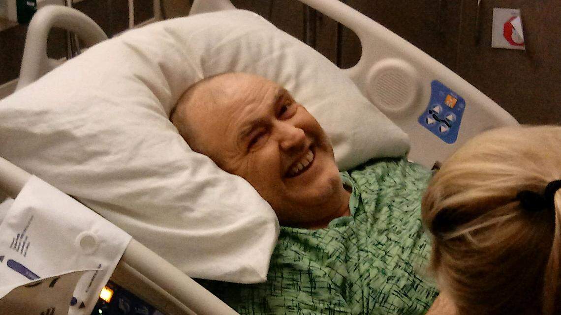"You can imagine the conflicted emotions," Joe Funderburk said about his brother, Don, shown in his hospital bed after receiving a life-saving kidney donation from a friend's son, who died after a car accident.