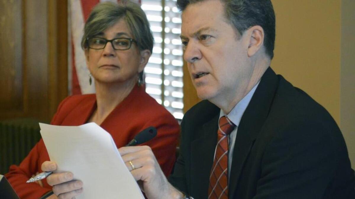Senate President Susan Wagle, a Wichita Republican, and Kansas Gov. Sam Brownback.