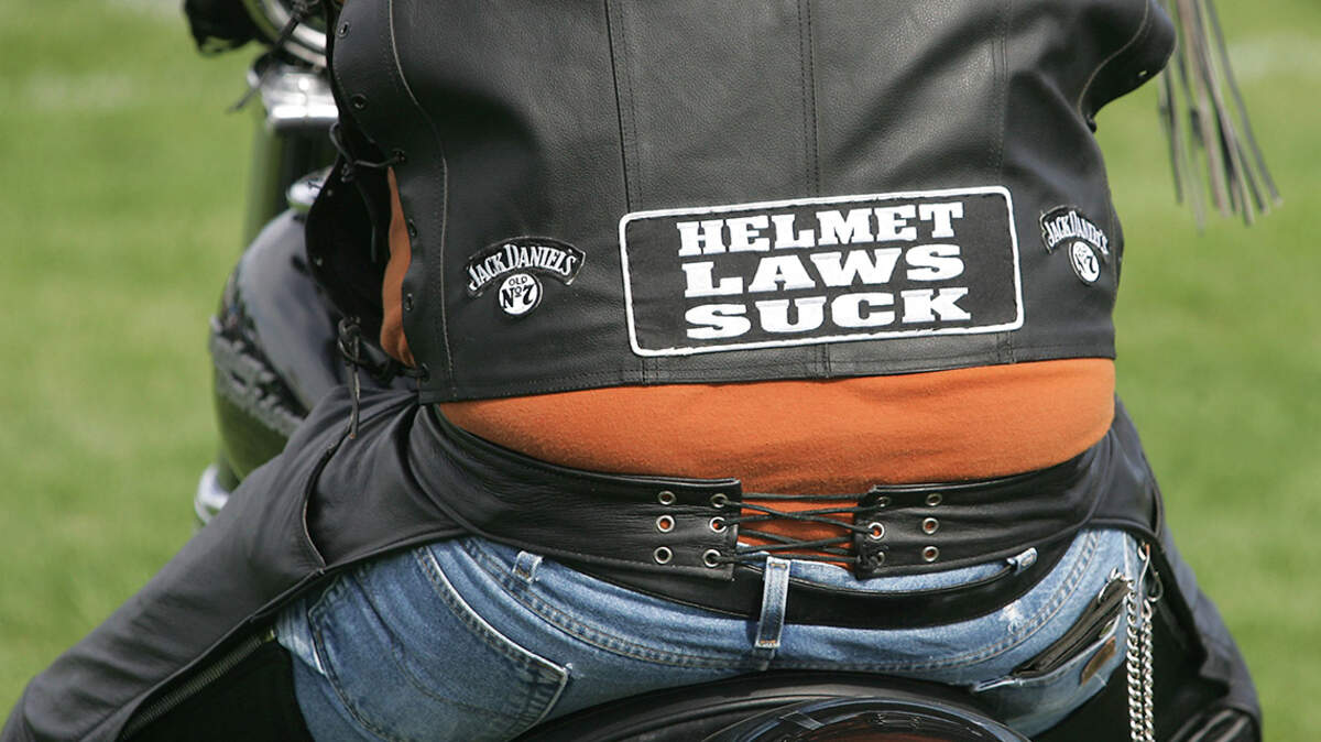 A motorcyclist wears a patch on his riding vest declaring his opinion of Washington state’s mandatory motorcycle helmet law.